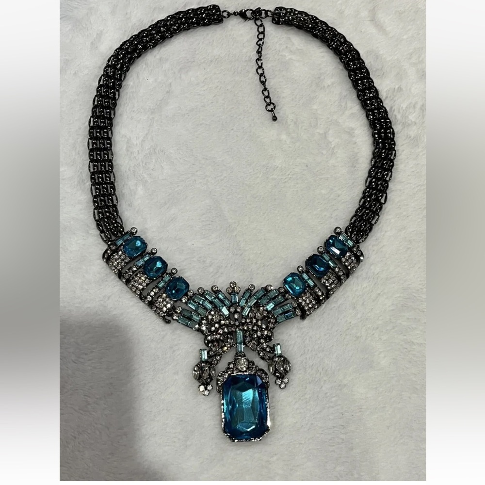 Off Park Collection dark metallic necklace with aqua blue colored stones .